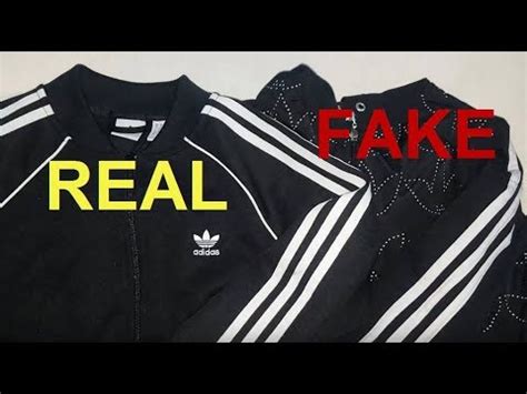 fake adidas jacket with|how to spot a fake adidas.